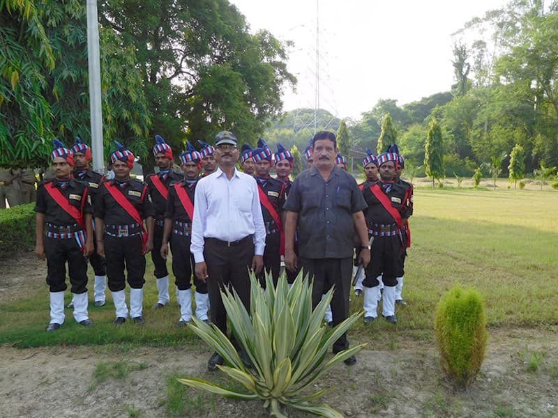 Company directors with a ceremonial guard detail