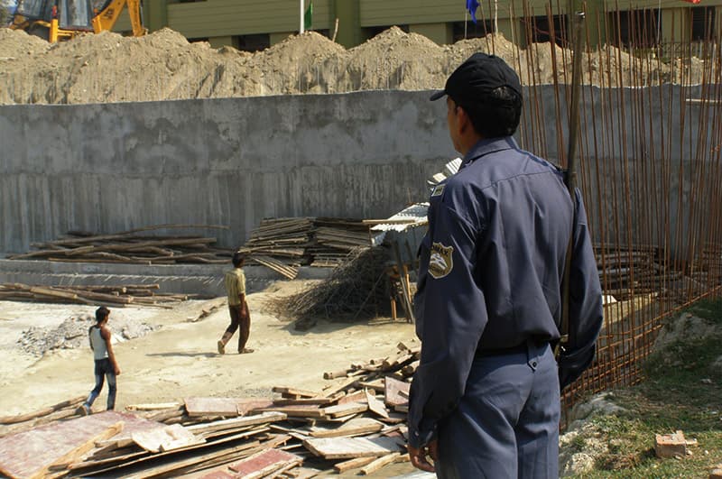 A guard watching over a construction site