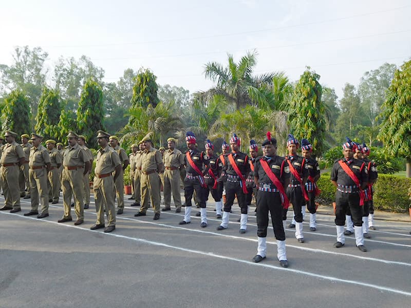 Omax guards and uniformed officers on parade