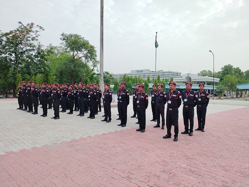 Omax personnel in formation on a parade ground
